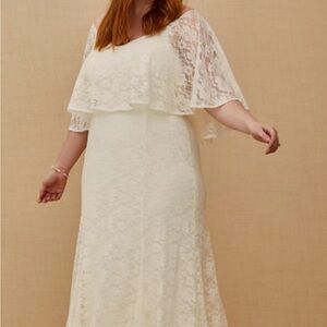 Torrid ivory lace long wedding dress. Sleeveless style with lace overlay.